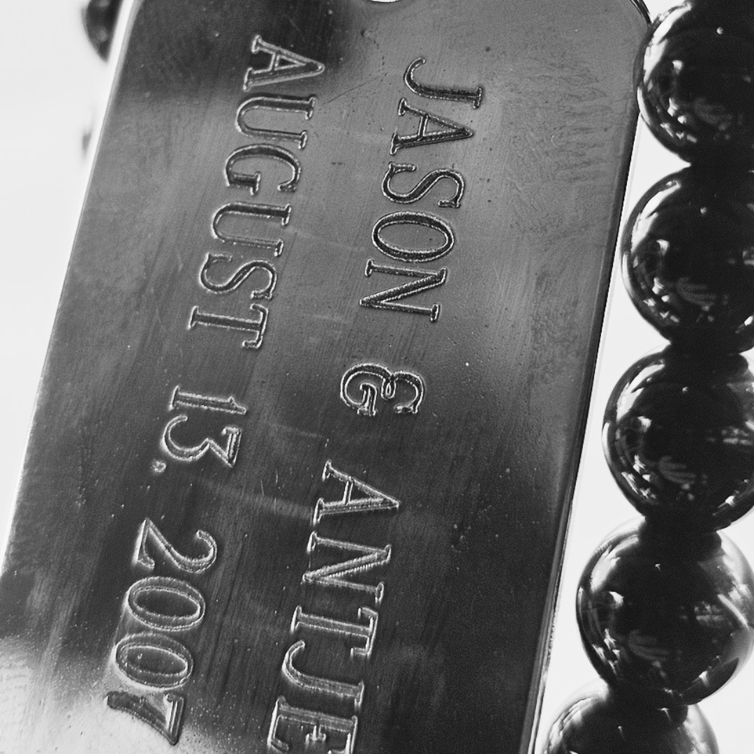 The engraved dog tags from the day they married