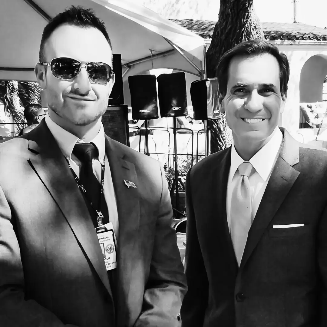 Jason Dangel with John Kirby during his federal service