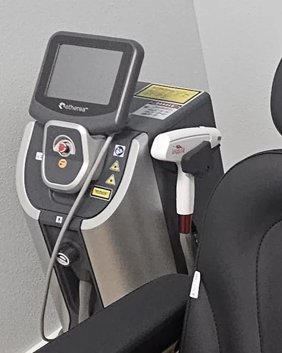 Etherea laser console with the LongPulse handpiece docked at its side, in the laser room at Eternal MedSpa Sarasota